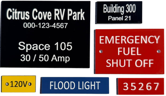 Professional UV-stable phenolic labels for industrial use. Precision engraved identification tags for RV parks, building panels, and emergency shut-off systems in high-visibility safety colors.